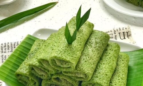 Dadar Gulung Pandan (Thin Pandan Pancake Rolls Stuffed With Sweet Grated Coconut)