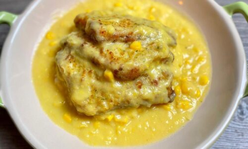 Fried Fish Filet In Creamy Corn Sauce On Rice