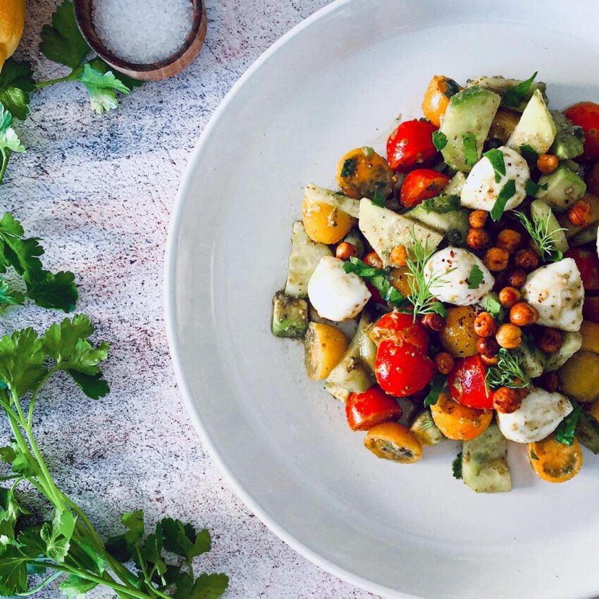 Avocado Tomato Salad With Mozzarella Balls And Pesto Sauce