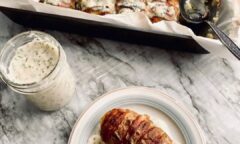 Baked Husselback Potatoes With White Sauce