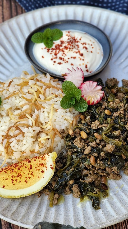 Spinach Stew Served With Some Rice
