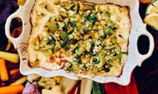 Baked Feta Cheese And Artichoke Dip With An Italian Cerniglia Olive