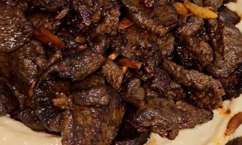 Hummus Topped With Lamb Backstraps