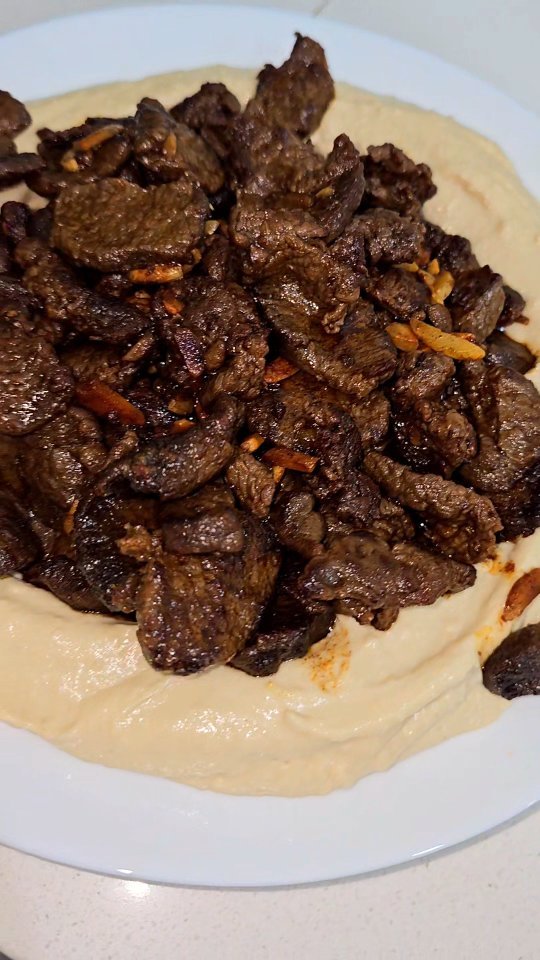 Hummus Topped With Lamb Backstraps